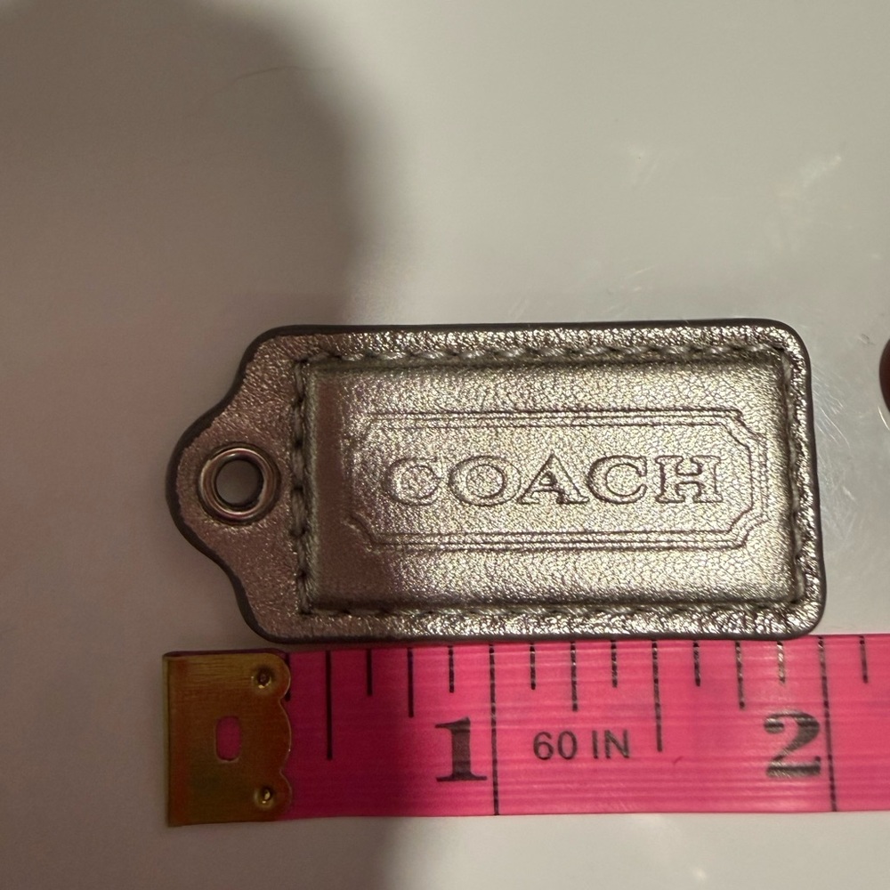 Coach gray metallic 2in hang tag